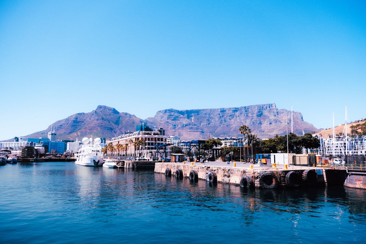 Vibrant image of Cape Town's waterfront with Table Mountain in the background.