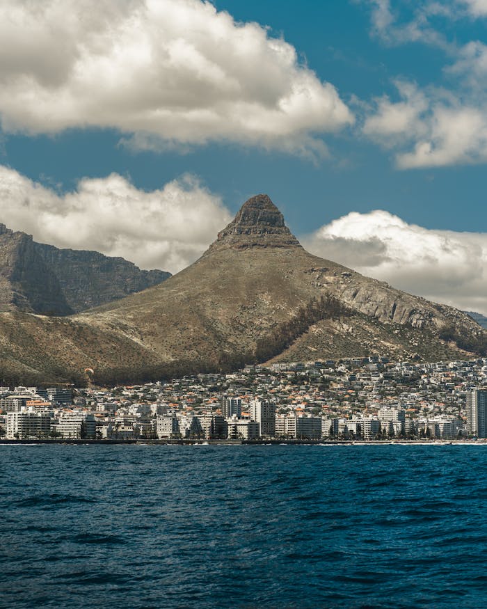 Breathtaking view of Cape Town's coastline with Lion's Head and vibrant sky.